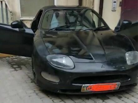 Черный Мицубиси ФТО, объемом двигателя 2 л и пробегом 680 тыс. км за 7500 $, фото 1 на Automoto.ua