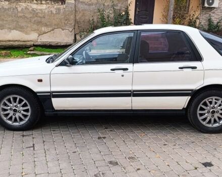 Белый Мицубиси Галант, объемом двигателя 2 л и пробегом 400 тыс. км за 1500 $, фото 4 на Automoto.ua