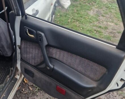 Белый Мицубиси Галант, объемом двигателя 2 л и пробегом 450 тыс. км за 1100 $, фото 3 на Automoto.ua