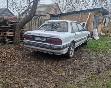 Белый Мицубиси Галант, объемом двигателя 2 л и пробегом 450 тыс. км за 1100 $, фото 5 на Automoto.ua