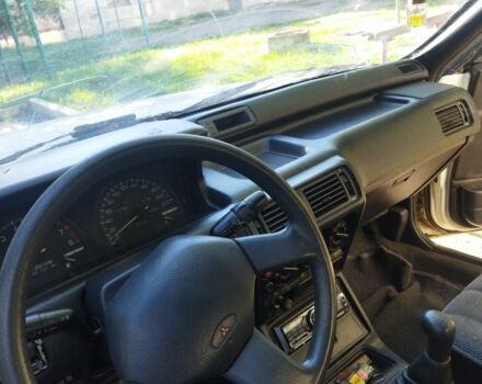 Белый Мицубиси Галант, объемом двигателя 2 л и пробегом 273 тыс. км за 650 $, фото 4 на Automoto.ua