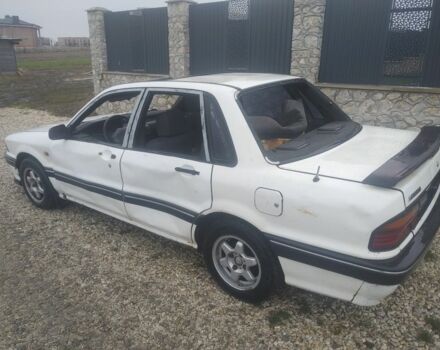 Белый Мицубиси Галант, объемом двигателя 0 л и пробегом 111 тыс. км за 600 $, фото 1 на Automoto.ua