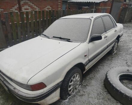 Белый Мицубиси Галант, объемом двигателя 1.8 л и пробегом 205 тыс. км за 1000 $, фото 1 на Automoto.ua