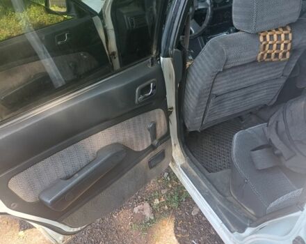 Белый Мицубиси Галант, объемом двигателя 1.8 л и пробегом 447 тыс. км за 1200 $, фото 2 на Automoto.ua