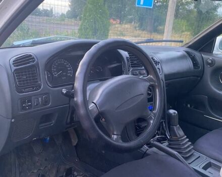 Белый Мицубиси Галант, объемом двигателя 1.8 л и пробегом 207 тыс. км за 2000 $, фото 4 на Automoto.ua