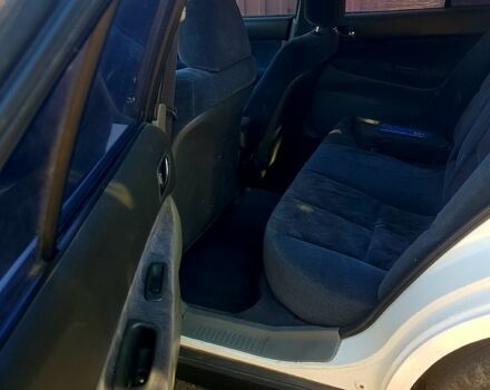 Белый Мицубиси Галант, объемом двигателя 2 л и пробегом 200 тыс. км за 1750 $, фото 3 на Automoto.ua