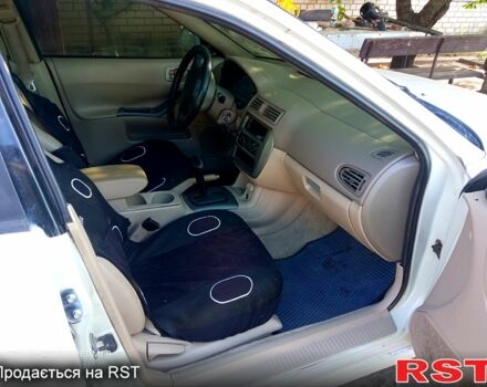 Белый Мицубиси Галант, объемом двигателя 2 л и пробегом 160 тыс. км за 3999 $, фото 3 на Automoto.ua