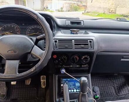 Білий Міцубісі Галант, об'ємом двигуна 2 л та пробігом 400 тис. км за 1500 $, фото 5 на Automoto.ua