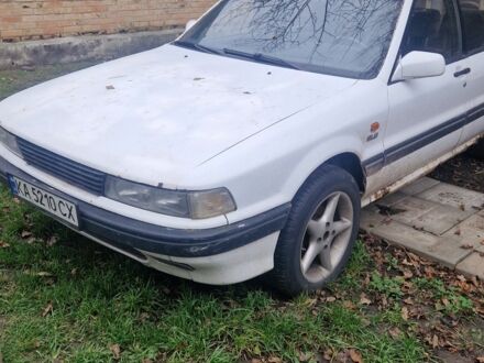 Белый Мицубиси Галант, объемом двигателя 2 л и пробегом 450 тыс. км за 1100 $, фото 1 на Automoto.ua