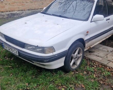 Білий Міцубісі Галант, об'ємом двигуна 2 л та пробігом 450 тис. км за 1100 $, фото 1 на Automoto.ua