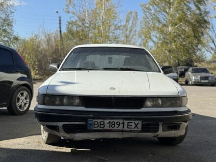 Белый Мицубиси Галант, объемом двигателя 2 л и пробегом 200 тыс. км за 700 $, фото 1 на Automoto.ua