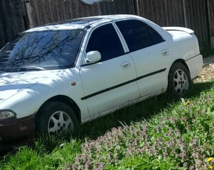 Білий Міцубісі Галант, об'ємом двигуна 2 л та пробігом 300 тис. км за 800 $, фото 1 на Automoto.ua
