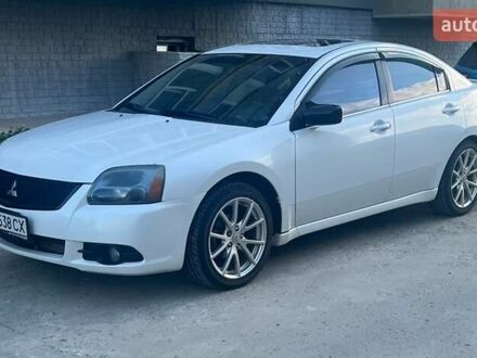 Белый Мицубиси Галант, объемом двигателя 2.38 л и пробегом 130 тыс. км за 9500 $, фото 1 на Automoto.ua