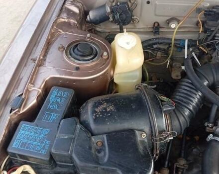 Бежевый Мицубиси Галант, объемом двигателя 2 л и пробегом 500 тыс. км за 1200 $, фото 4 на Automoto.ua