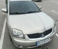 Бежевый Мицубиси Галант, объемом двигателя 2.4 л и пробегом 320 тыс. км за 5000 $, фото 1 на Automoto.ua
