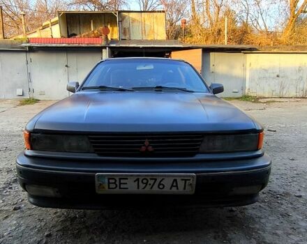 Черный Мицубиси Галант, объемом двигателя 1.8 л и пробегом 300 тыс. км за 1800 $, фото 1 на Automoto.ua