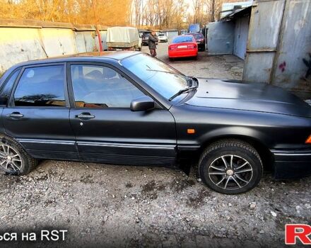 Черный Мицубиси Галант, объемом двигателя 1.8 л и пробегом 300 тыс. км за 1800 $, фото 2 на Automoto.ua