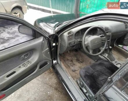 Черный Мицубиси Галант, объемом двигателя 2 л и пробегом 160 тыс. км за 3000 $, фото 7 на Automoto.ua