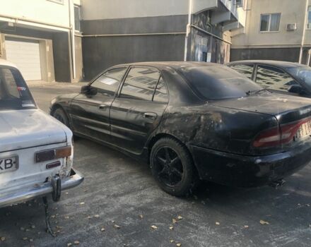 Черный Мицубиси Галант, объемом двигателя 2 л и пробегом 84 тыс. км за 900 $, фото 2 на Automoto.ua