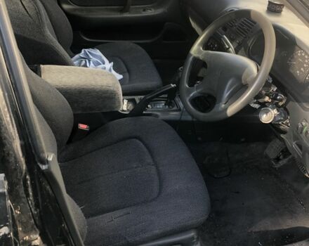 Черный Мицубиси Галант, объемом двигателя 2 л и пробегом 84 тыс. км за 900 $, фото 4 на Automoto.ua