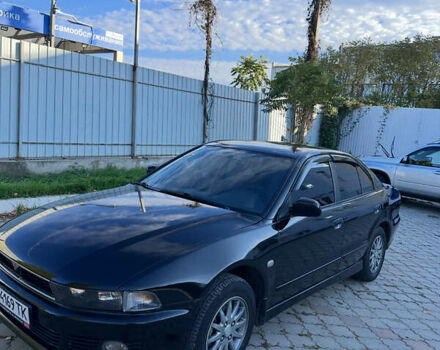 Чорний Міцубісі Галант, об'ємом двигуна 2 л та пробігом 330 тис. км за 5000 $, фото 1 на Automoto.ua