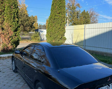 Чорний Міцубісі Галант, об'ємом двигуна 2 л та пробігом 330 тис. км за 5000 $, фото 3 на Automoto.ua