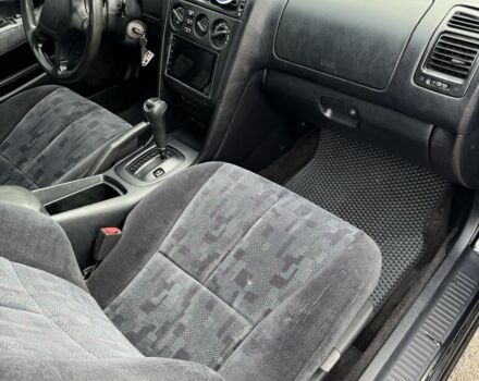 Черный Мицубиси Галант, объемом двигателя 2 л и пробегом 164 тыс. км за 5000 $, фото 2 на Automoto.ua