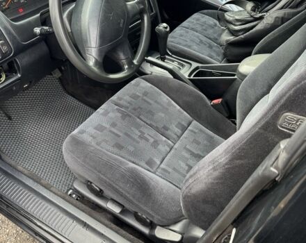 Черный Мицубиси Галант, объемом двигателя 2 л и пробегом 164 тыс. км за 5000 $, фото 3 на Automoto.ua