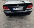 Черный Мицубиси Галант, объемом двигателя 2 л и пробегом 164 тыс. км за 5000 $, фото 1 на Automoto.ua