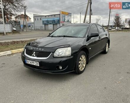 Черный Мицубиси Галант, объемом двигателя 2.38 л и пробегом 388 тыс. км за 5000 $, фото 17 на Automoto.ua