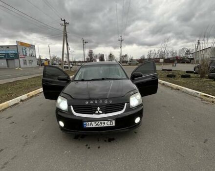 Черный Мицубиси Галант, объемом двигателя 2.38 л и пробегом 388 тыс. км за 5000 $, фото 1 на Automoto.ua