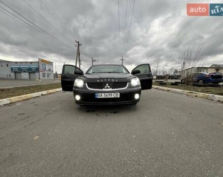 Черный Мицубиси Галант, объемом двигателя 2.38 л и пробегом 388 тыс. км за 5000 $, фото 2 на Automoto.ua