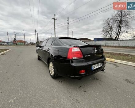 Черный Мицубиси Галант, объемом двигателя 2.38 л и пробегом 388 тыс. км за 5000 $, фото 4 на Automoto.ua