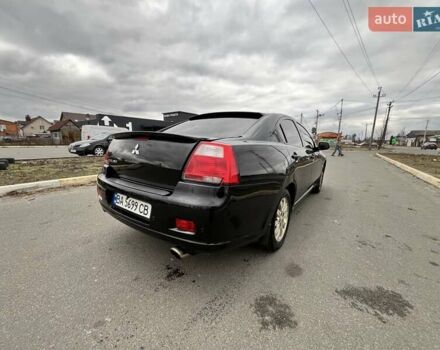 Черный Мицубиси Галант, объемом двигателя 2.38 л и пробегом 388 тыс. км за 5000 $, фото 16 на Automoto.ua