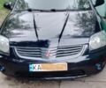 Черный Мицубиси Галант, объемом двигателя 2.4 л и пробегом 219 тыс. км за 4600 $, фото 1 на Automoto.ua