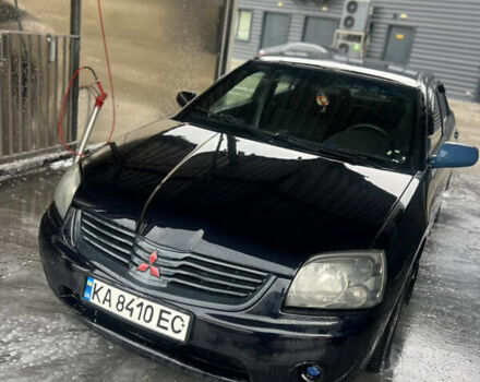 Черный Мицубиси Галант, объемом двигателя 2.38 л и пробегом 220 тыс. км за 2999 $, фото 1 на Automoto.ua