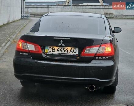 Черный Мицубиси Галант, объемом двигателя 2.38 л и пробегом 94 тыс. км за 12500 $, фото 26 на Automoto.ua