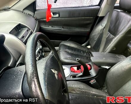 Черный Мицубиси Галант, объемом двигателя 2.4 л и пробегом 200 тыс. км за 1300 $, фото 2 на Automoto.ua