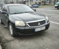 Черный Мицубиси Галант, объемом двигателя 2.38 л и пробегом 255 тыс. км за 4800 $, фото 1 на Automoto.ua