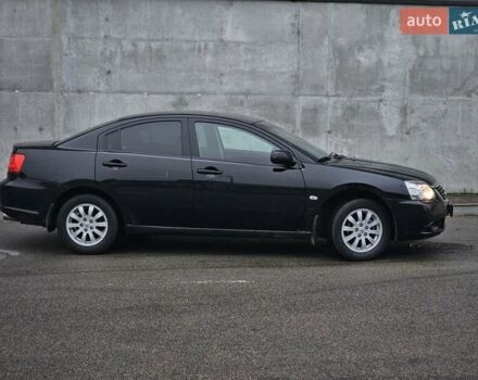 Черный Мицубиси Галант, объемом двигателя 2.38 л и пробегом 94 тыс. км за 12500 $, фото 1 на Automoto.ua