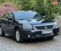 Черный Мицубиси Галант, объемом двигателя 2.4 л и пробегом 100 тыс. км за 6900 $, фото 1 на Automoto.ua