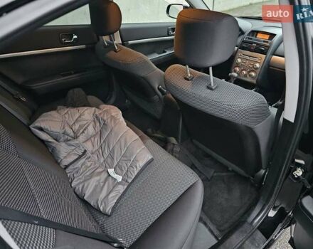 Черный Мицубиси Галант, объемом двигателя 2.38 л и пробегом 94 тыс. км за 12500 $, фото 11 на Automoto.ua