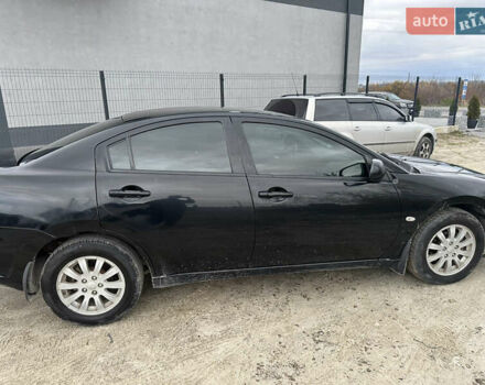 Черный Мицубиси Галант, объемом двигателя 2.38 л и пробегом 560 тыс. км за 3300 $, фото 5 на Automoto.ua