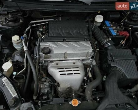 Черный Мицубиси Галант, объемом двигателя 2.38 л и пробегом 94 тыс. км за 12500 $, фото 12 на Automoto.ua