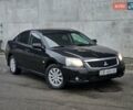 Черный Мицубиси Галант, объемом двигателя 2.38 л и пробегом 94 тыс. км за 12500 $, фото 1 на Automoto.ua