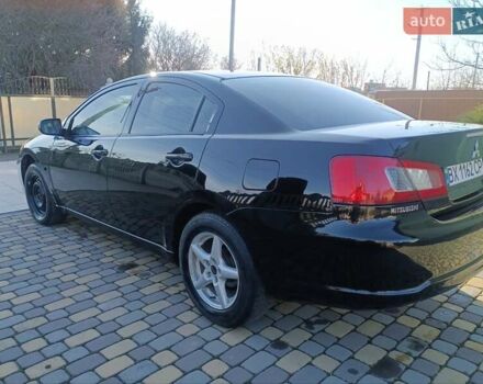 Черный Мицубиси Галант, объемом двигателя 2.38 л и пробегом 277 тыс. км за 3990 $, фото 7 на Automoto.ua