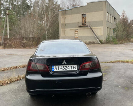 Черный Мицубиси Галант, объемом двигателя 2.4 л и пробегом 341 тыс. км за 5500 $, фото 5 на Automoto.ua
