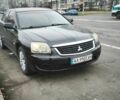 Черный Мицубиси Галант, объемом двигателя 2.4 л и пробегом 255 тыс. км за 4800 $, фото 1 на Automoto.ua
