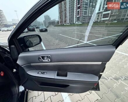 Черный Мицубиси Галант, объемом двигателя 2.38 л и пробегом 191 тыс. км за 6500 $, фото 11 на Automoto.ua