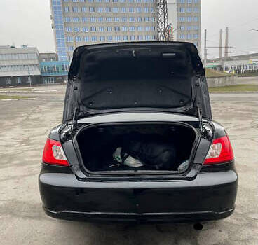 Черный Мицубиси Галант, объемом двигателя 2.38 л и пробегом 250 тыс. км за 6200 $, фото 4 на Automoto.ua